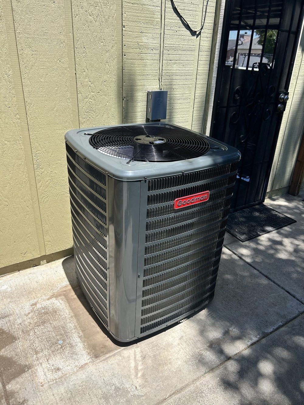 New Goodman air conditioning condenser installed at a Modesto home